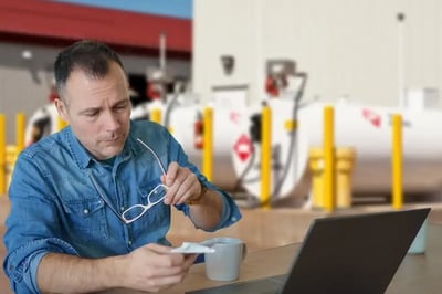 Fuel-Inventory-Management-Challenges-Stressed Manager In Front of Laptop Coencorp-SM2