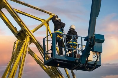 Workers on Hydraulic Lift