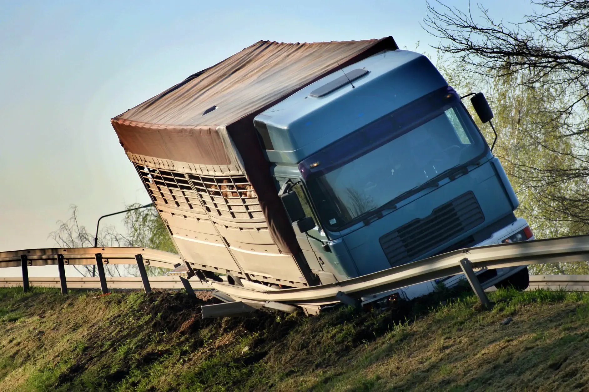 delivery truck on its side in the ditch because of inadequate fleet management software